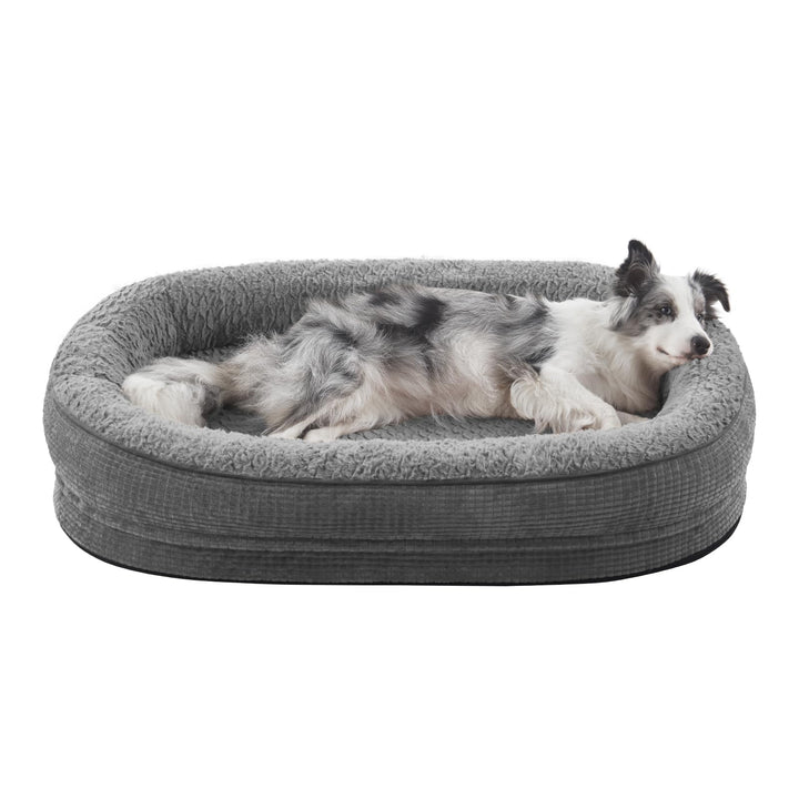 Large dog bed with memory foam and neck pillow in dark gray